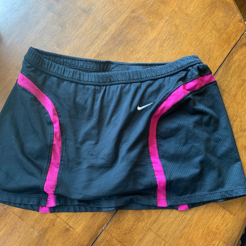 Nike tennis skirt, size XS(0-2) but fits more like a small! Good condition